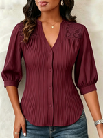 Lace-paneled V-neck Blouse Featuring Vertical Pleats, A Fitted Waist, And Puff Three-quarter Sleeves