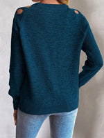 Long-sleeve Knit Pullover With Cut-out Fabric Strip Detailing And A Round Neck
