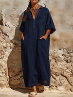 Long, Loose-fitting Dress Featuring A Collared, Semi-open V-neck, Dropped Shoulders, And Three-quarter Length Sleeves