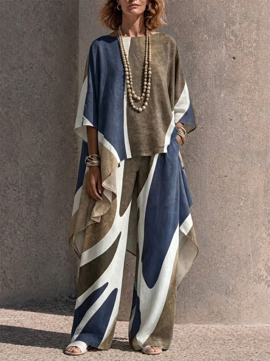 Two-piece Set Featuring An Asymmetrical Draped Top And Wide-leg Trousers With A Fluid Drape