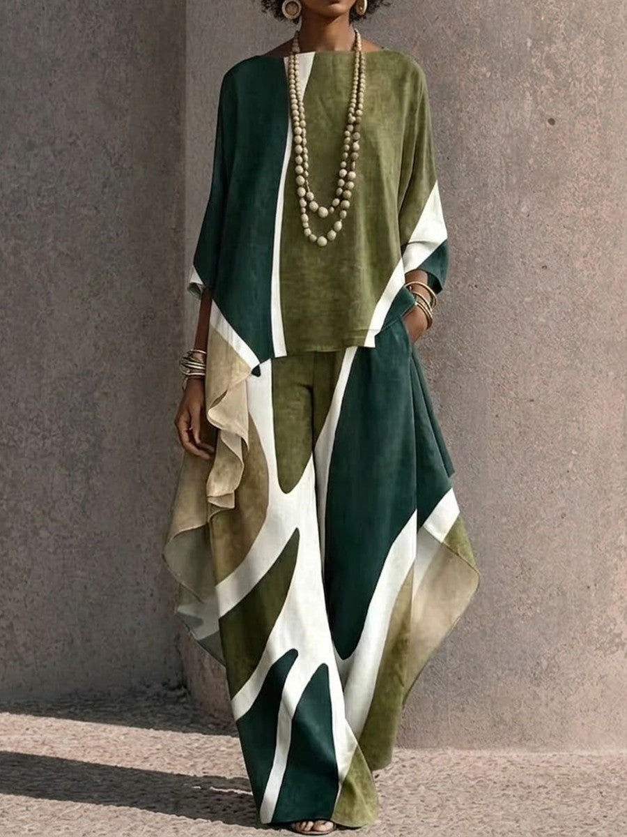 Two-piece Set Featuring An Asymmetrical Draped Top And Wide-leg Trousers With A Fluid Drape