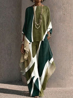 Two-piece Set Featuring An Asymmetrical Draped Top And Wide-leg Trousers With A Fluid Drape